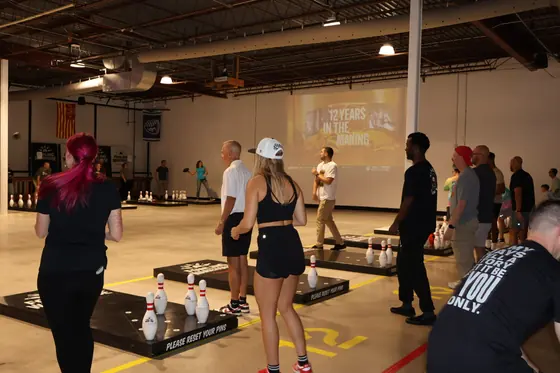 Players and onlookers at the lanes