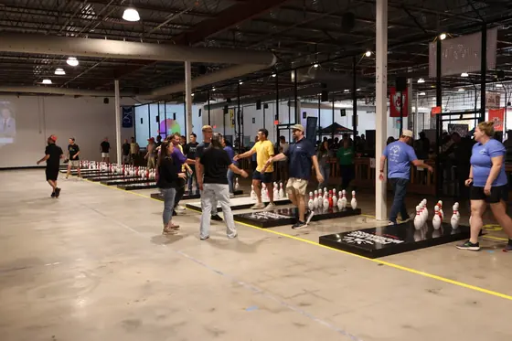Players spread across the lanes in the distance