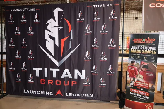 The Titan Group banner beside a Junk King sign